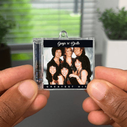 Guys "N Dolls, The Greatest Hits Albumtag